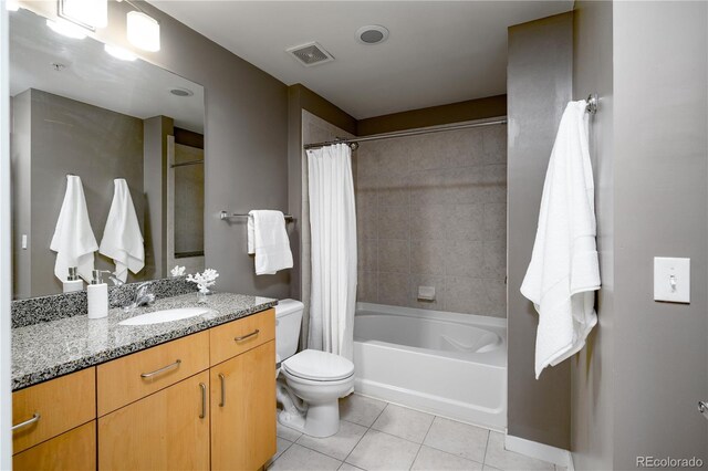 1700 Bassett St Unit 1119, Denver, CO 80202 - bathroom featuring tile patterned floors, toilet, vanity, and shower / bath combo