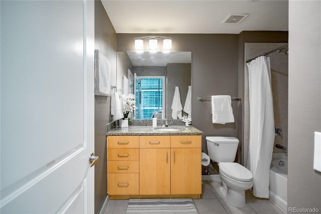 1700 Bassett St Unit 1119, Denver, CO 80202 - full bath featuring toilet, vanity, shower / bath combo with shower curtain, tile patterned floors, and baseboards