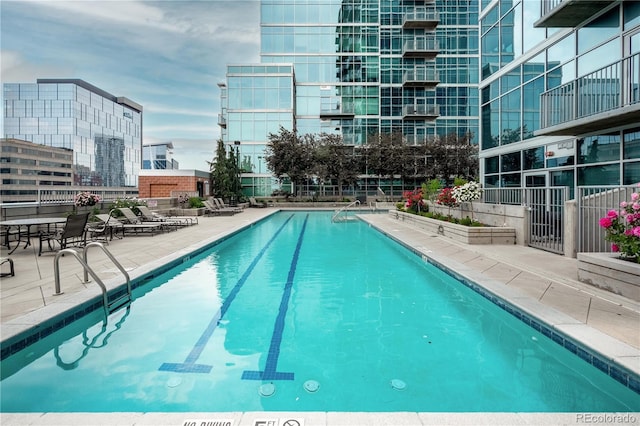 1700 Bassett St Unit 1119, Denver, CO 80202 - community pool featuring a patio area