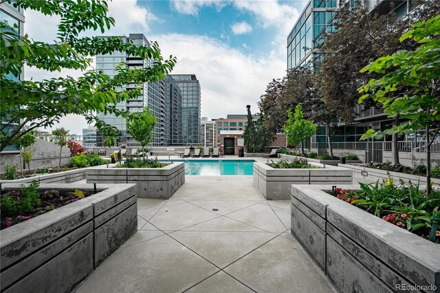 1700 Bassett St Unit 1119, Denver, CO 80202 - community pool with a city view and a patio