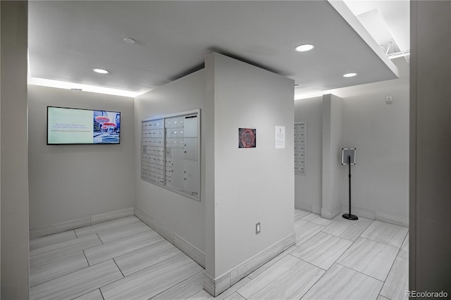 1700 Bassett St Unit 1119, Denver, CO 80202 - corridor with mail area, recessed lighting, and baseboards