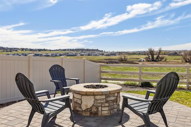 6214 Long Branch Dr, Parker, CO 80134 - view of patio featuring an outdoor fire pit and fence