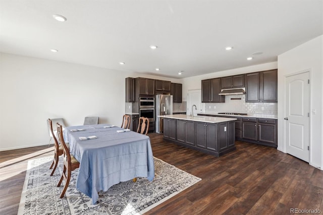 6214 Long Branch Dr, Parker, CO 80134 - dining room with recessed lighting and dark wood-style floors