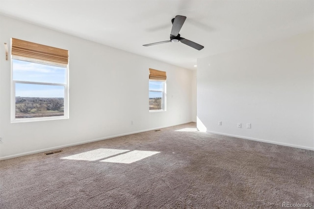 6214 Long Branch Dr, Parker, CO 80134 - carpeted spare room with baseboards, a ceiling fan, and visible vents