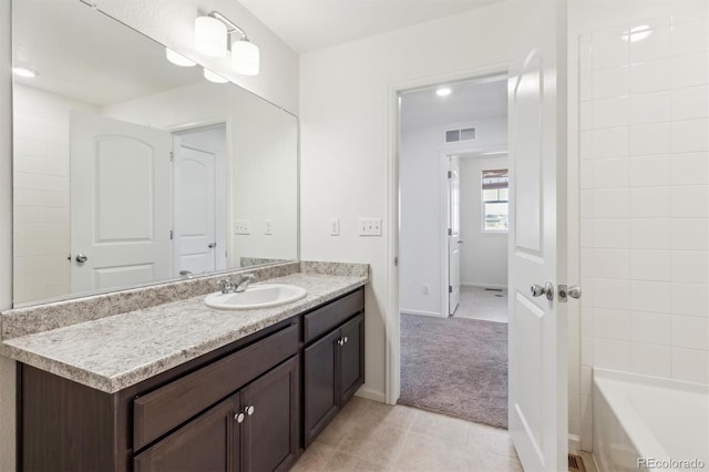 6214 Long Branch Dr, Parker, CO 80134 - bathroom with baseboards, tile patterned floors, vanity, and visible vents