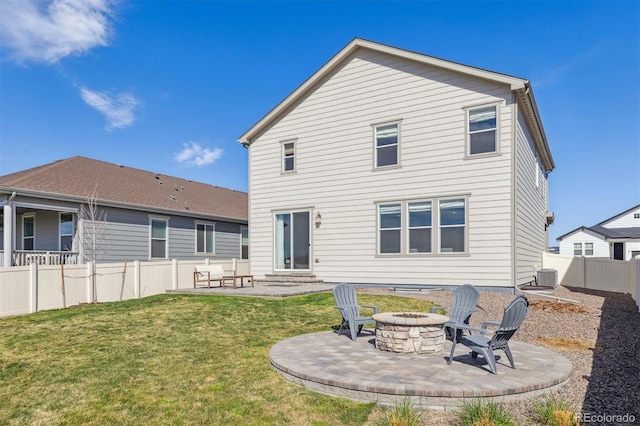 6214 Long Branch Dr, Parker, CO 80134 - back of property featuring a patio, a fire pit, a lawn, central AC unit, and entry steps