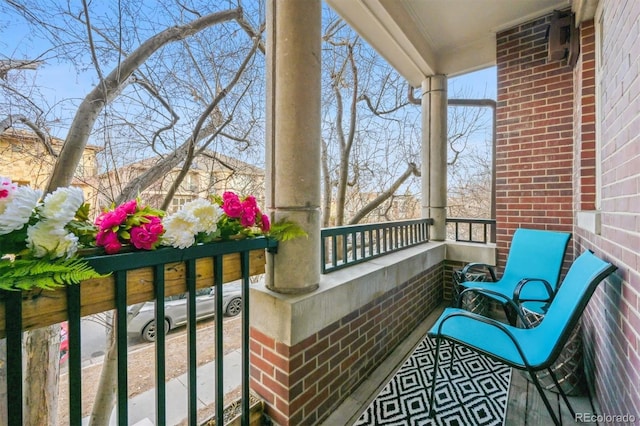 balcony featuring a porch