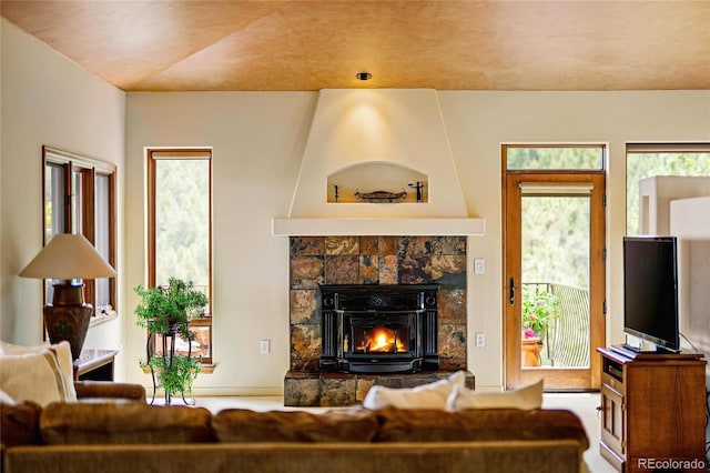 8932 Eastridge Rd, Golden, CO 80403 - living area featuring a stone fireplace