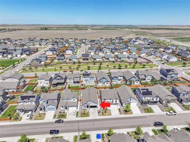 aerial overview of property's location with nearby suburban area