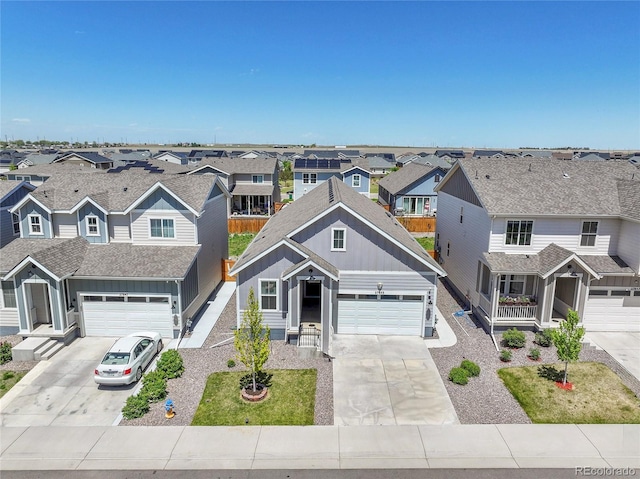27853 E 8th Ave, Aurora, CO 80018 - traditional-style house with board and batten siding, driveway, and a residential view
