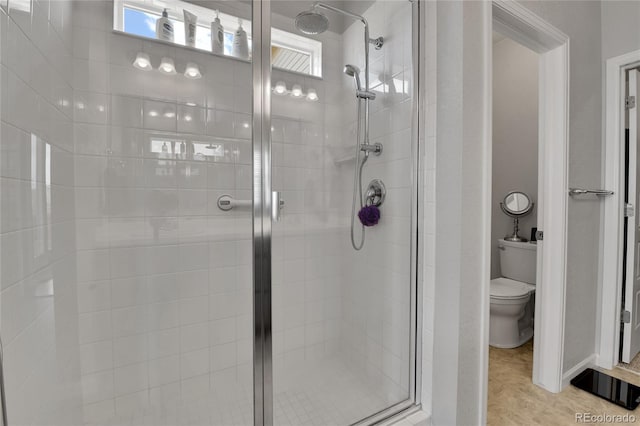 27853 E 8th Ave, Aurora, CO 80018 - bathroom featuring a stall shower and plenty of natural light