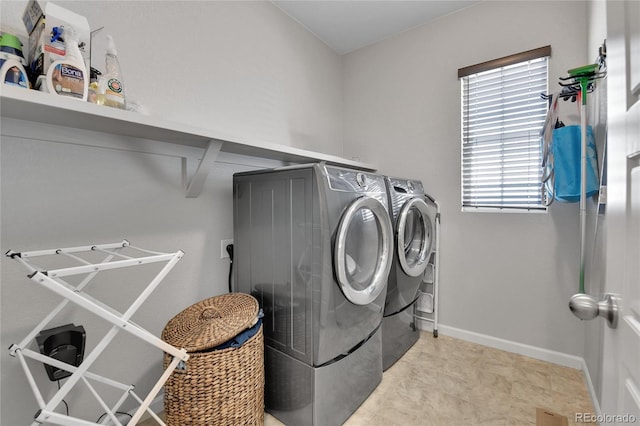 27853 E 8th Ave, Aurora, CO 80018 - laundry area featuring independent washer and dryer and baseboards
