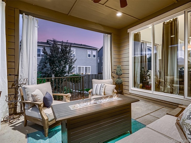 view of patio featuring a ceiling fan and an outdoor hangout area