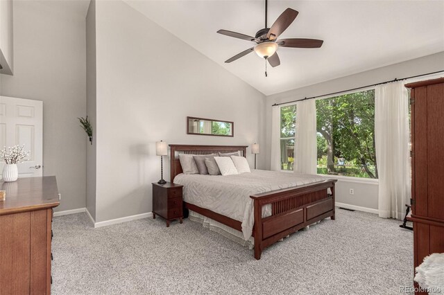 392 Driftwood Cir, Lafayette, CO 80026 - bedroom featuring light colored carpet, high vaulted ceiling, and a ceiling fan