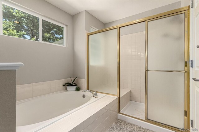 392 Driftwood Cir, Lafayette, CO 80026 - bathroom featuring a stall shower and a bath