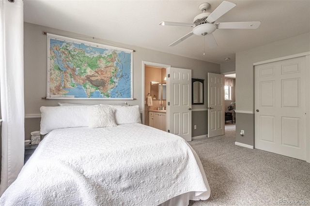 392 Driftwood Cir, Lafayette, CO 80026 - bedroom with carpet flooring, ensuite bathroom, and ceiling fan