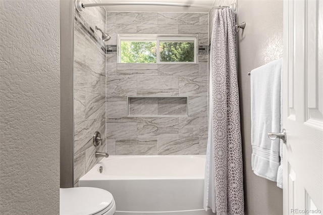392 Driftwood Cir, Lafayette, CO 80026 - bathroom featuring a textured wall and shower / tub combo
