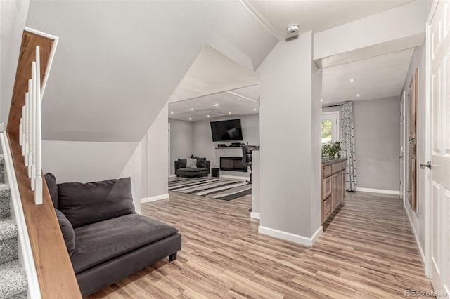 392 Driftwood Cir, Lafayette, CO 80026 - sitting room with light wood-type flooring, stairway, and recessed lighting
