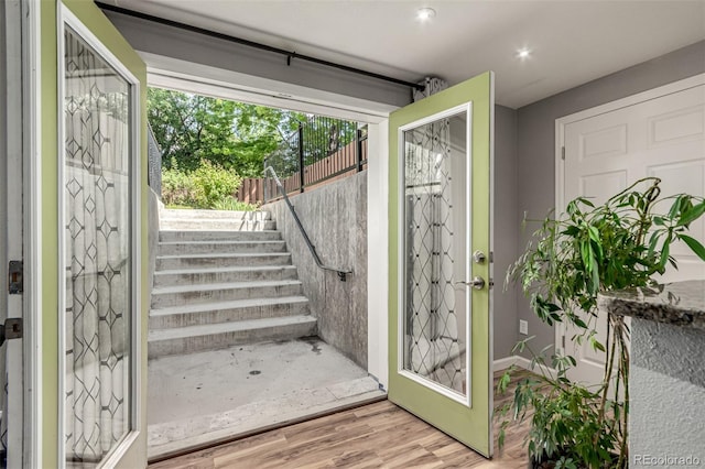 392 Driftwood Cir, Lafayette, CO 80026 - entrance foyer with wood finished floors, stairs, and recessed lighting