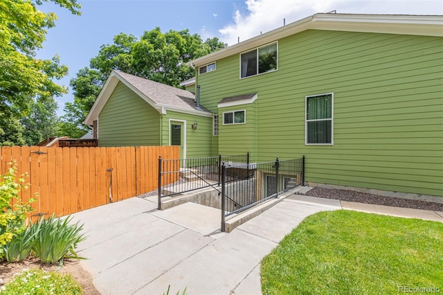 392 Driftwood Cir, Lafayette, CO 80026 - rear view of house featuring a patio area