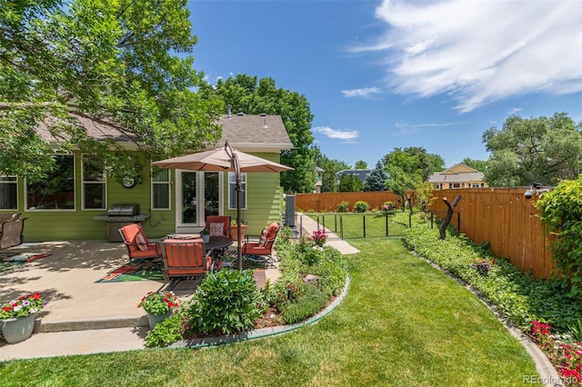 392 Driftwood Cir, Lafayette, CO 80026 - fenced backyard with a patio