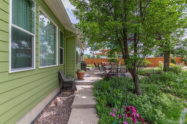 392 Driftwood Cir, Lafayette, CO 80026 - fenced backyard featuring a patio
