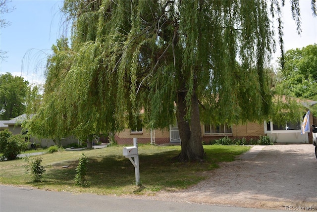 2885 Quay St, Wheat Ridge, CO 80033 - view of front of property with a front lawn and brick siding