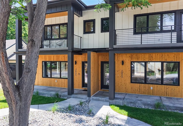 2405 S Franklin, Denver, CO 80210 - modern home with a balcony and covered porch