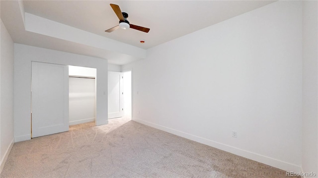 2405 S Franklin, Denver, CO 80210 - unfurnished bedroom with light carpet, a closet, and ceiling fan