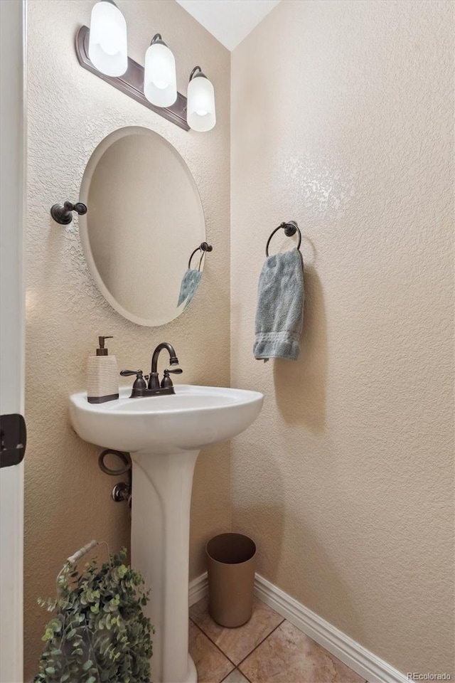 bathroom featuring tile patterned flooring