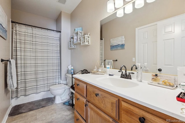 bathroom featuring vanity, toilet, and a shower with shower curtain