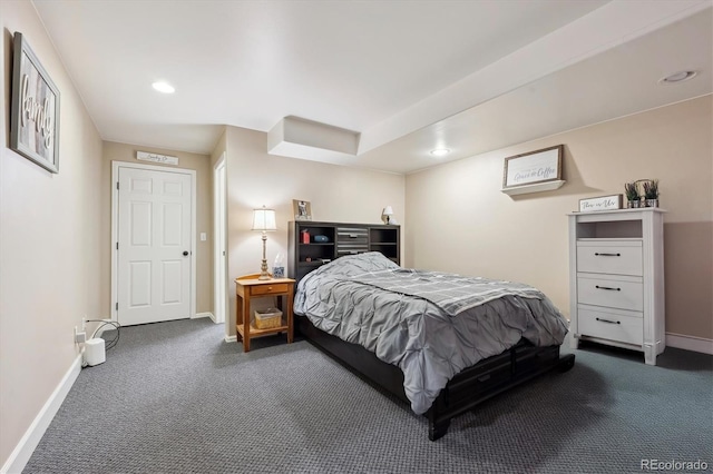 bedroom with dark carpet