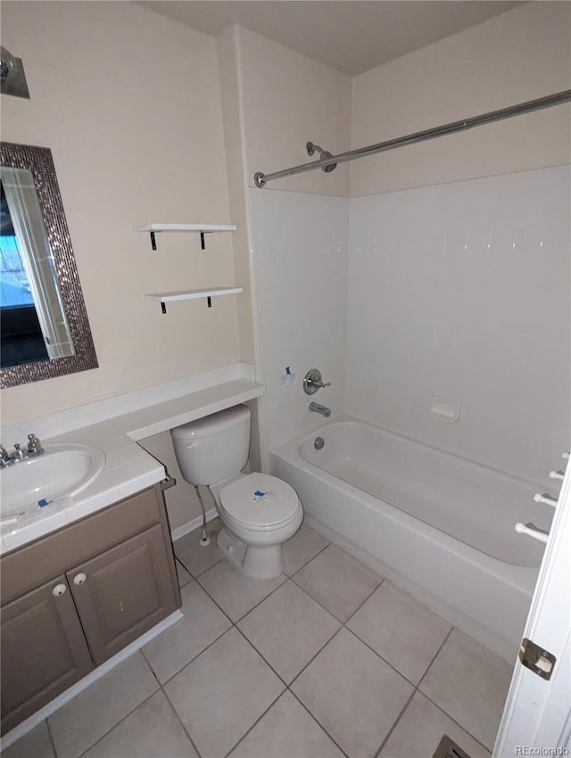 full bathroom with tile patterned floors, bathtub / shower combination, vanity, and toilet