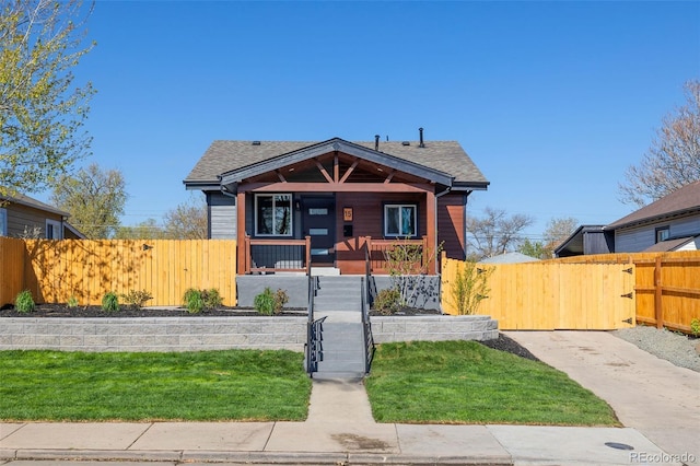 15 Hazel Ct, Denver, CO 80219 - bungalow-style house featuring covered porch, a gate, roof with shingles, and stairs