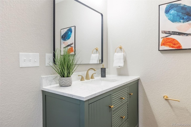 15 Hazel Ct, Denver, CO 80219 - bathroom with a textured wall and vanity