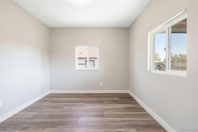 15 Hazel Ct, Denver, CO 80219 - empty room featuring baseboards and wood finished floors