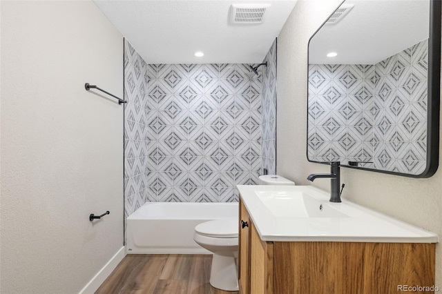 15 Hazel Ct, Denver, CO 80219 - bathroom with toilet, wood finished floors, vanity, shower / bathtub combination, and baseboards