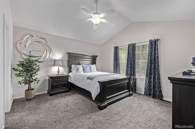 carpeted bedroom featuring lofted ceiling, baseboards, and a ceiling fan