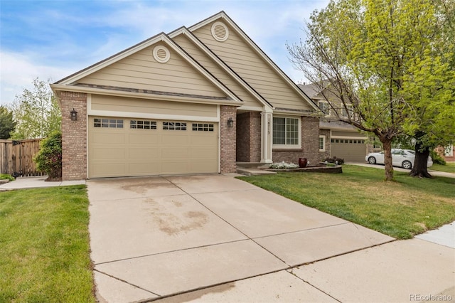 ranch-style home featuring brick siding, driveway, and an attached garage