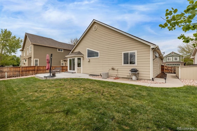 14713 Josephine St, Thornton, CO 80602 - back of house featuring a patio and central air condition unit