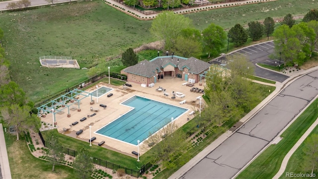 view from above of property featuring a pool area