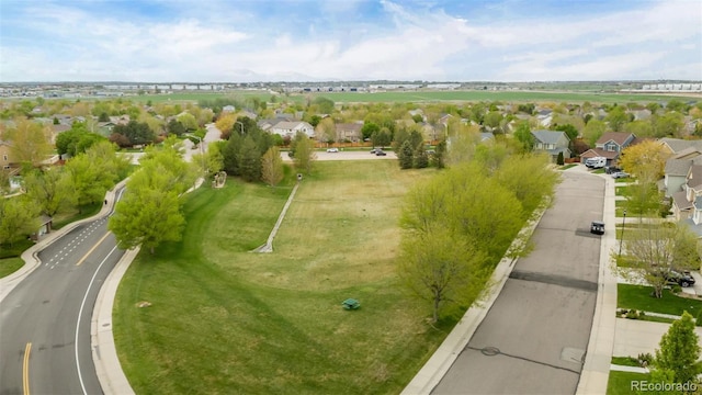 aerial view of property's location featuring nearby suburban area