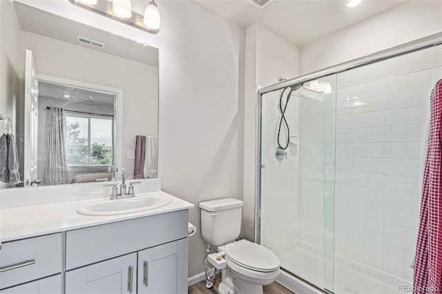 1918 W 165th Way, Broomfield, CO 80023 - bathroom with a stall shower, vanity, and wood finished floors