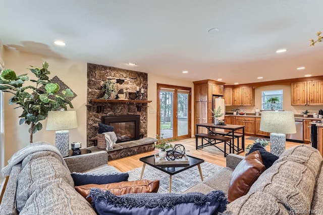 26732 Main St, Conifer, CO 80433 - living room with light wood finished floors, recessed lighting, and a fireplace