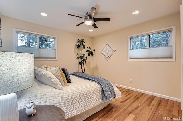 26732 Main St, Conifer, CO 80433 - bedroom featuring multiple windows, light wood-style flooring, recessed lighting, and a ceiling fan