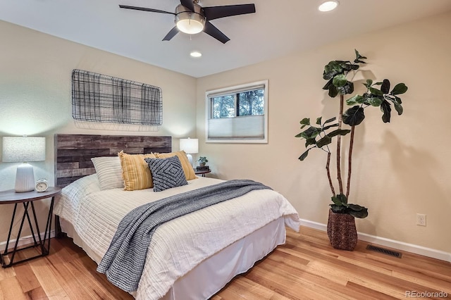 26732 Main St, Conifer, CO 80433 - bedroom with wood finished floors, recessed lighting, and ceiling fan