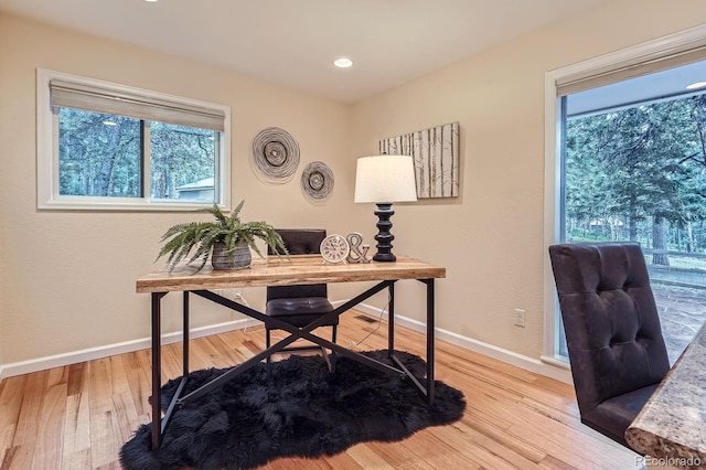26732 Main St, Conifer, CO 80433 - office area with healthy amount of natural light, wood finished floors, and recessed lighting