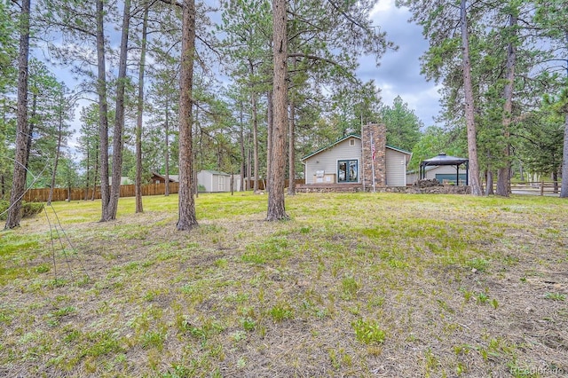 26732 Main St, Conifer, CO 80433 - view of yard with a storage shed