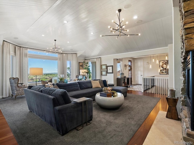 6405 Warriors Run, Littleton, CO 80125 - living room featuring a chandelier, wood finished floors, wood ceiling, ornamental molding, and recessed lighting