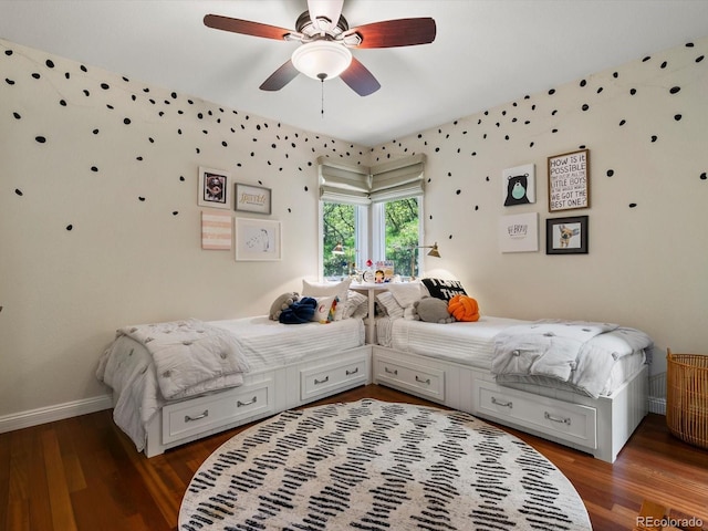 6405 Warriors Run, Littleton, CO 80125 - bedroom featuring a ceiling fan, wood finished floors, and baseboards